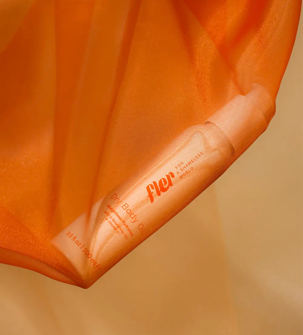 DRY BODY OIL - Vaj i thatë hidratues për trupin me përthithje të menjëhershme dhe ndjesi mëndafshi